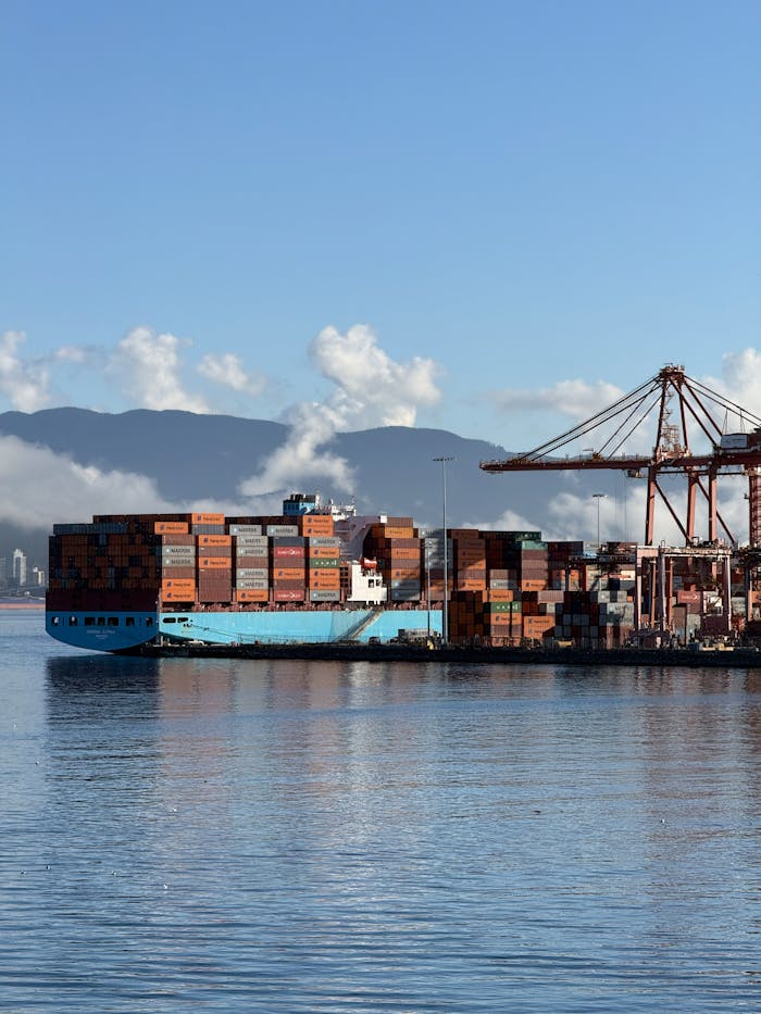 services-03 A cargo ship docked at a shipping container terminal in Vancouver, Canada.
